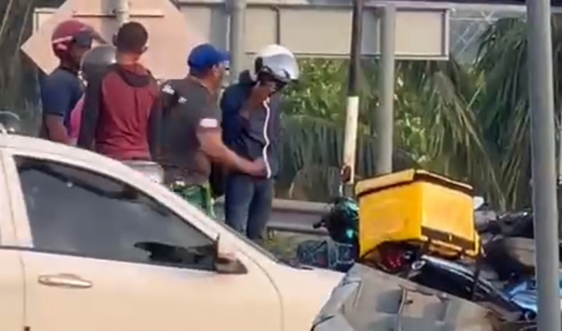 Road bully wanted by cops after clip of delivery rider assault goes viral