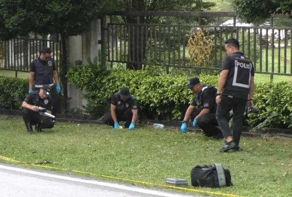 Mechanic shot at Penang workshop, jumps cemetery fence to escape gunmen