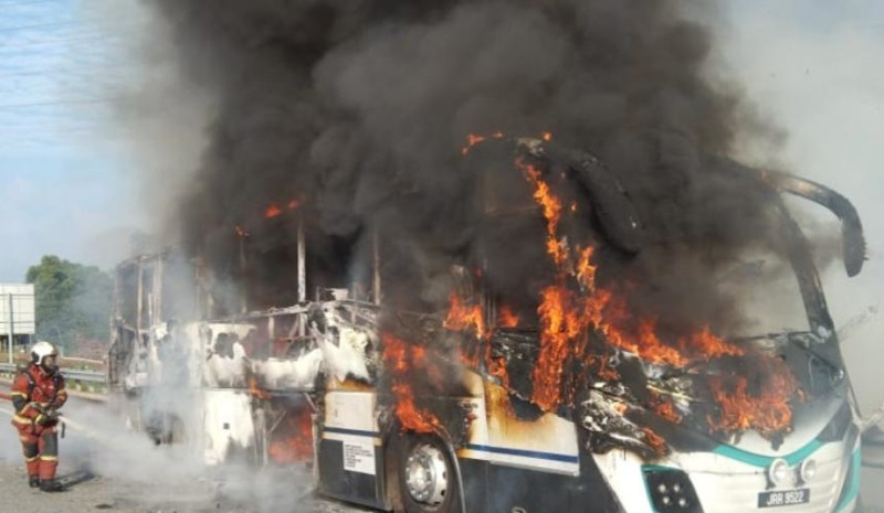 Tour bus and lorry destroyed in separate highway fires, no casualties reported