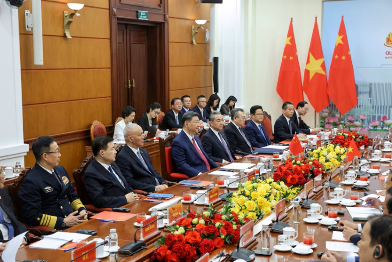 China - Vietnam sign deals as Xi visits Hanoi amid US tariff tensions