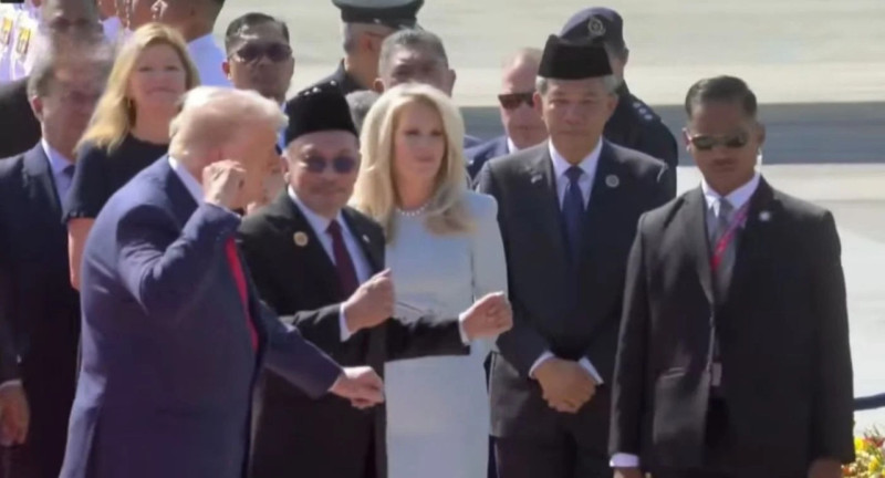 Donald Trump dances with local performers during welcoming ceremony