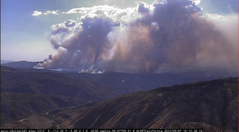 Massive California wildfire eases with rains