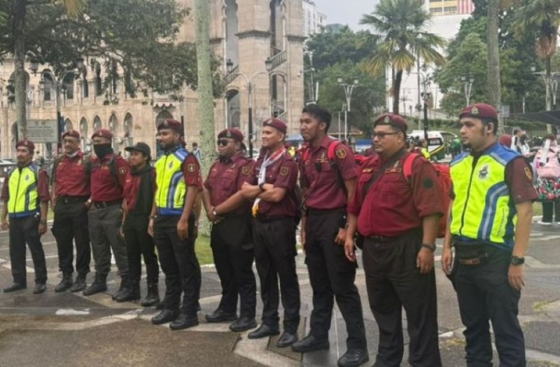 Thousands expected to march through heavy rain in Kuala Lumpur to rally for Gaza