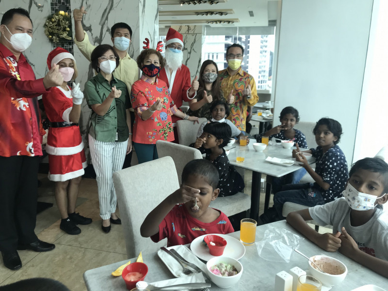 Four friends bring spirit of Christmas to orphanages