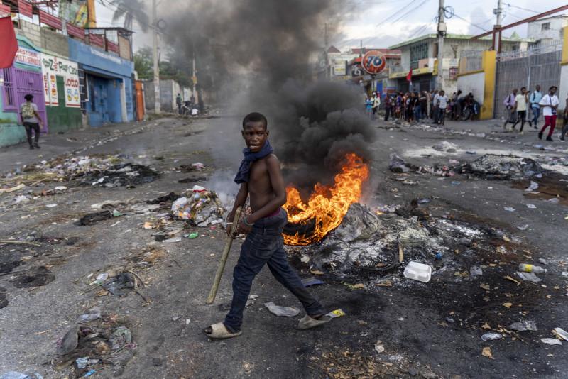 Thousands march in Haiti to protest calls for intervention