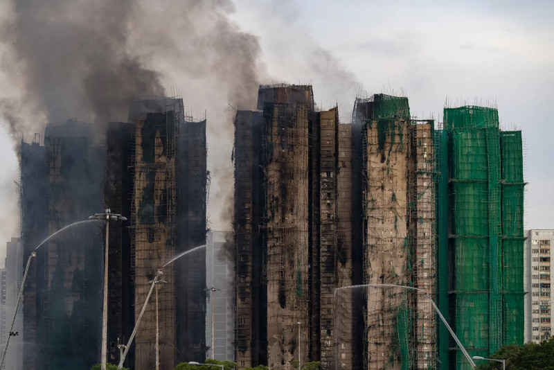 Hong Kong fire survivor confronts trauma as residents return to devastated homes