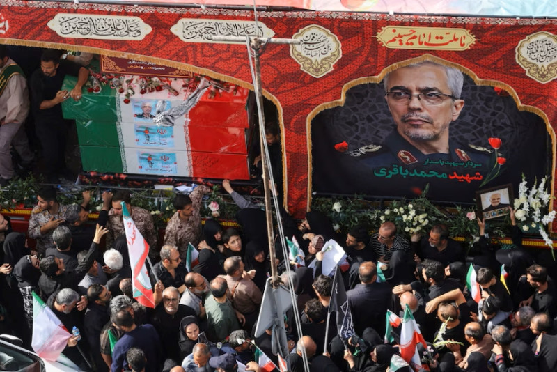 Iran holds funeral for top military commanders and scientists killed by Israel