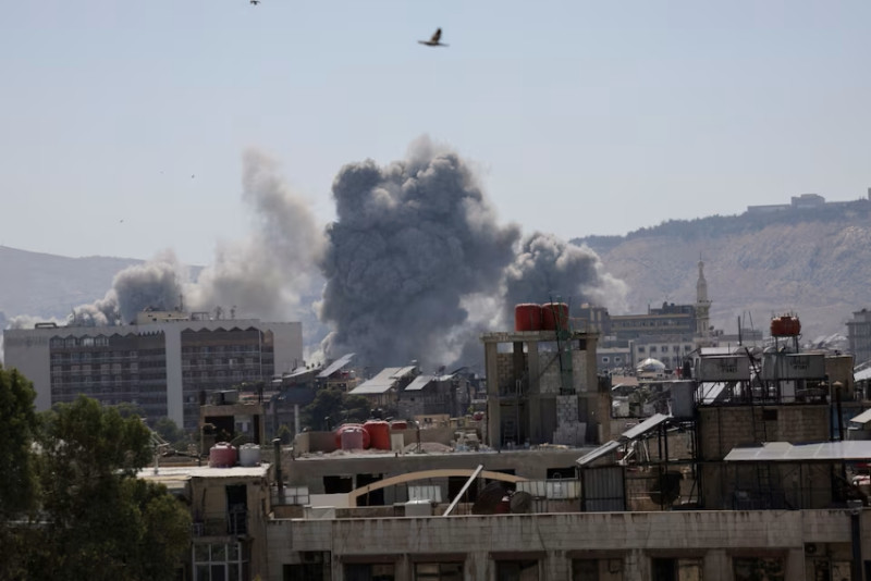 Israel launches heavy airstrikes in Damascus, vowing to protect Druze