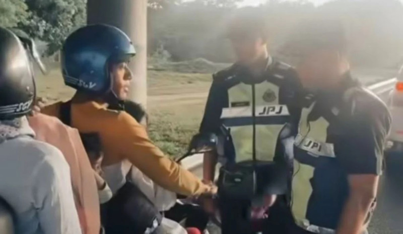 JPJ officers praised for assisting family caught in heavy rain on North-South Expressway