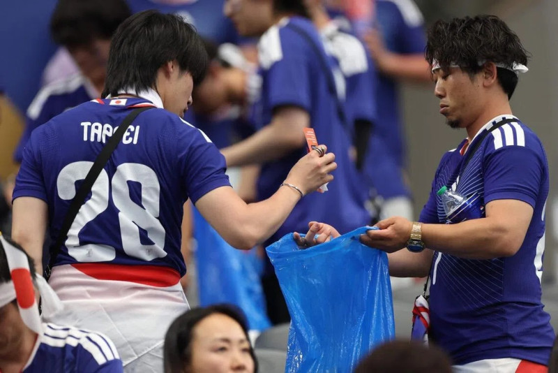 Viral stadium clean-up by Japanese fans sparks debate over gender roles and responsibilities