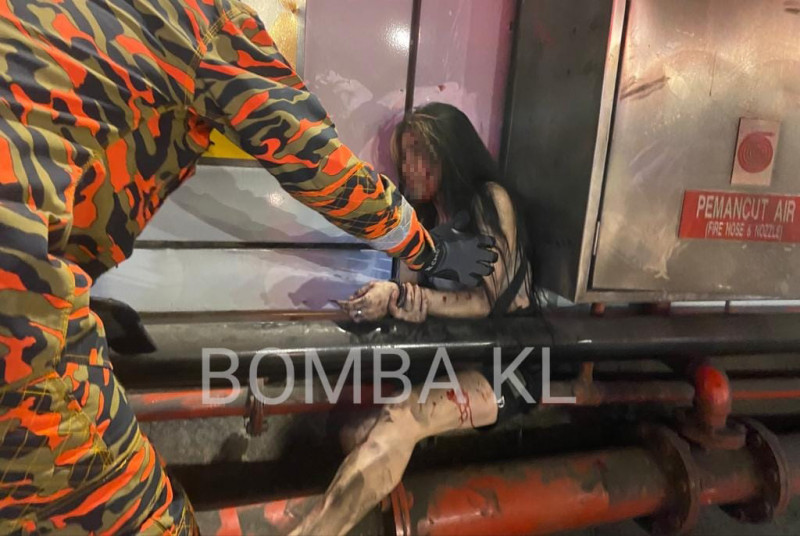 [UPDATED] KLCC tunnel mishap: mother, son injured in motorbike crash 