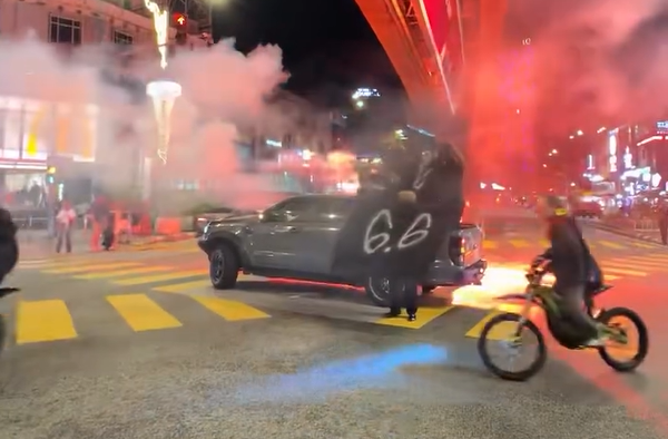 Cops hunt group after dangerous flare stunt in heart of Kuala Lumpur (video)