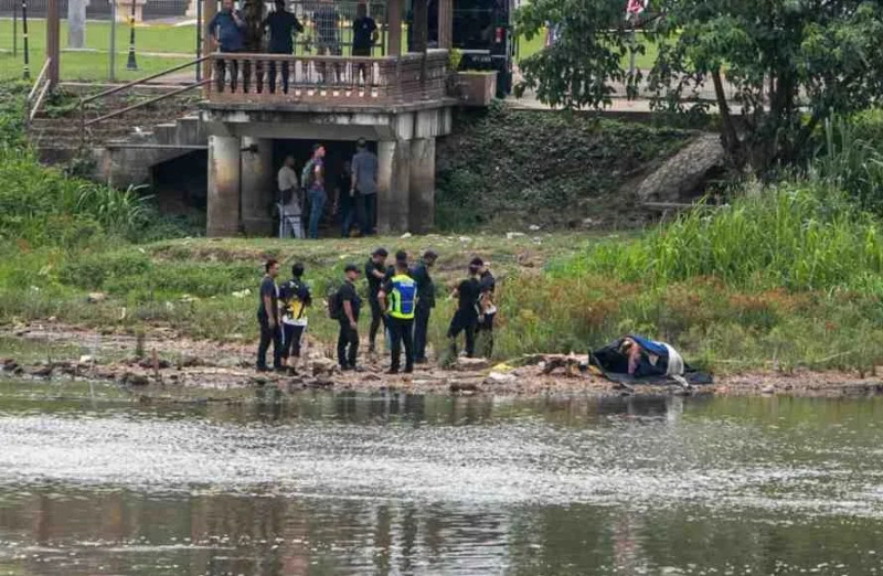 Woman found dead in suitcase in Perak River as police open murder probe