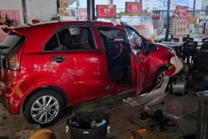 Woman killed by collapsing iron pole after car crashes into Kajang food court