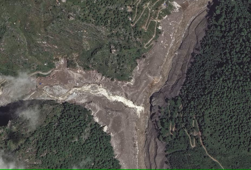 Landslide lake overflows on Nepal-China border renews fears of another deadly flood