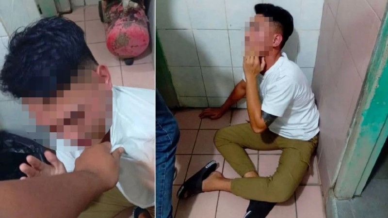 Peeping Tom detained by public after allegedly filming woman inside restaurant toilet