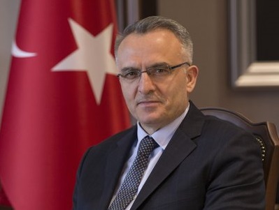 Erdogan fires central bank governor, puts ex-minister in post