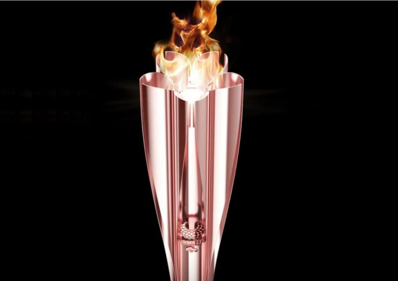 Paralympic flame arrives in Tokyo as virus surges days before opening