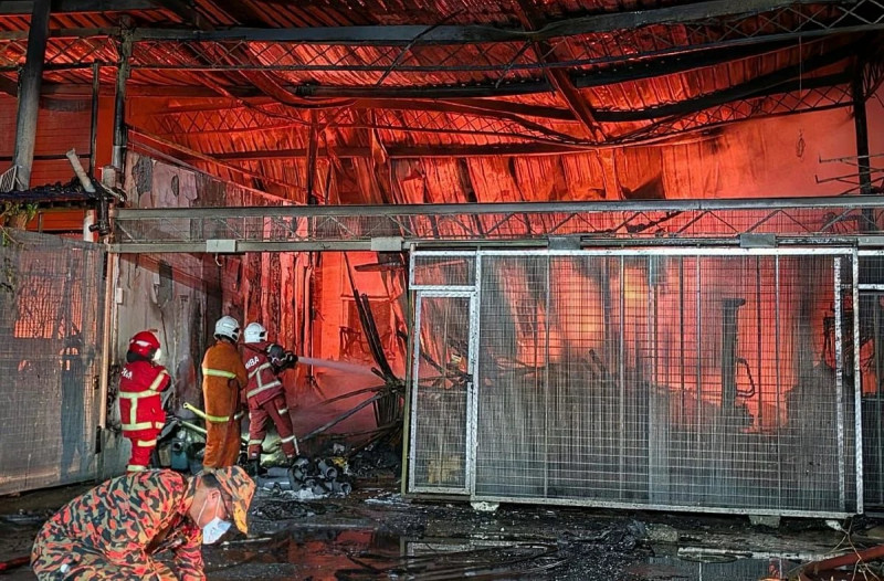 Fire destroys three warehouses, 12 vehicles in Penampang blaze