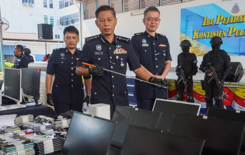 Police bust online scratch and win scam syndicate operating from luxury bungalows in Penang