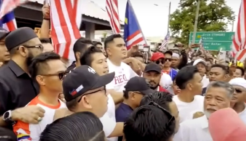 Penang DAP urges action against UMNO youth chief over flag protest march