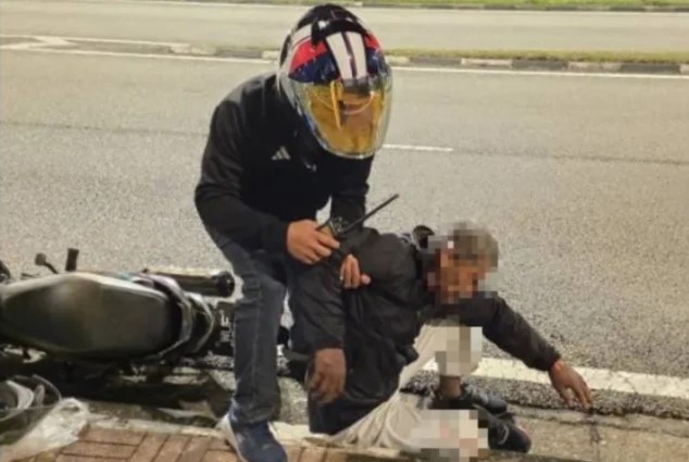 KL traffic police chief praised for assisting injured motorcyclist during patrol