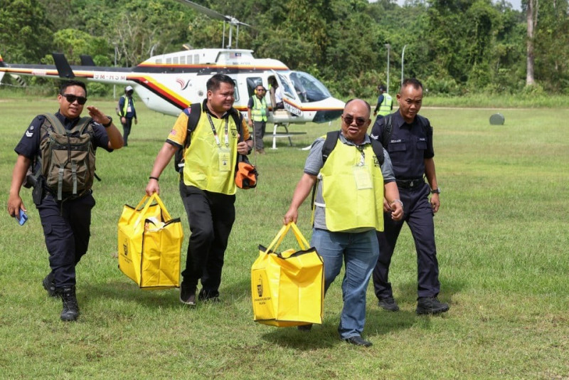 Vote counting underway in Kinabatangan as early ballot boxes arrive by helicopter