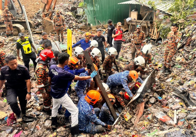 Sabah landslides kill seven, three still missing on eve of Malaysia Day