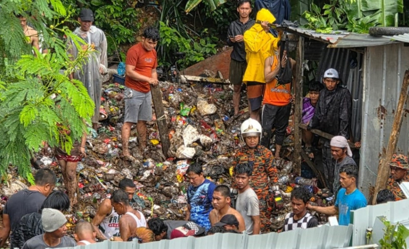 Sabah landslides kill one woman, several still missing