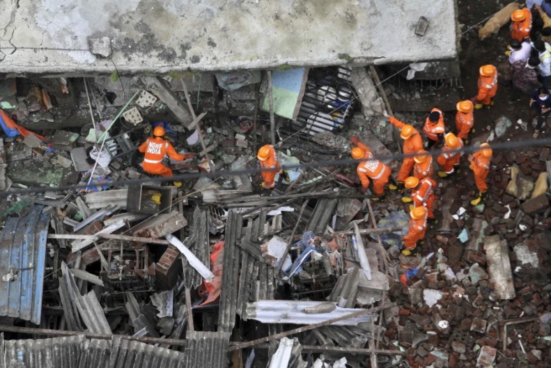 10 dead, up to 25 feared trapped in India building collapse