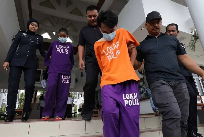 Two men charged with trafficking 14-year-old twin sisters for sex