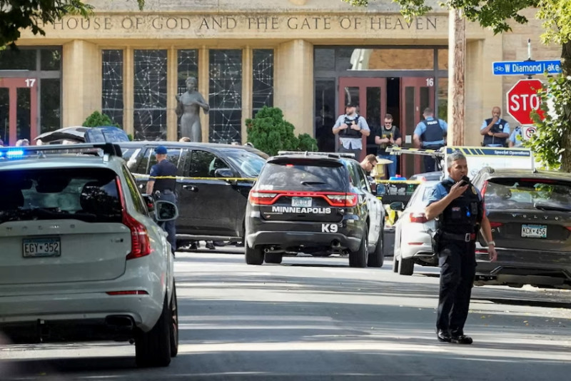 Shooter kills two Minneapolis school children in Catholic church, wounds 17 others