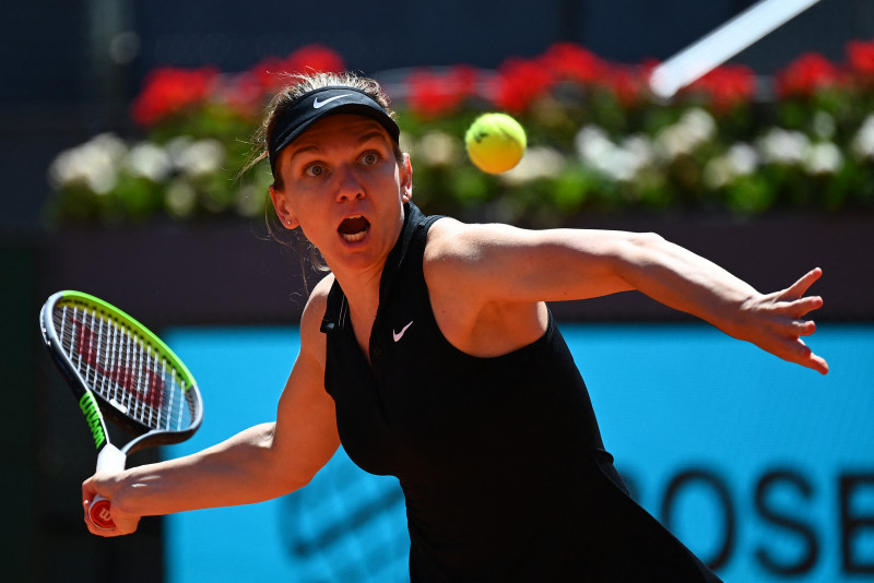 Halep knocked out of Madrid Open, Thiem cruises through