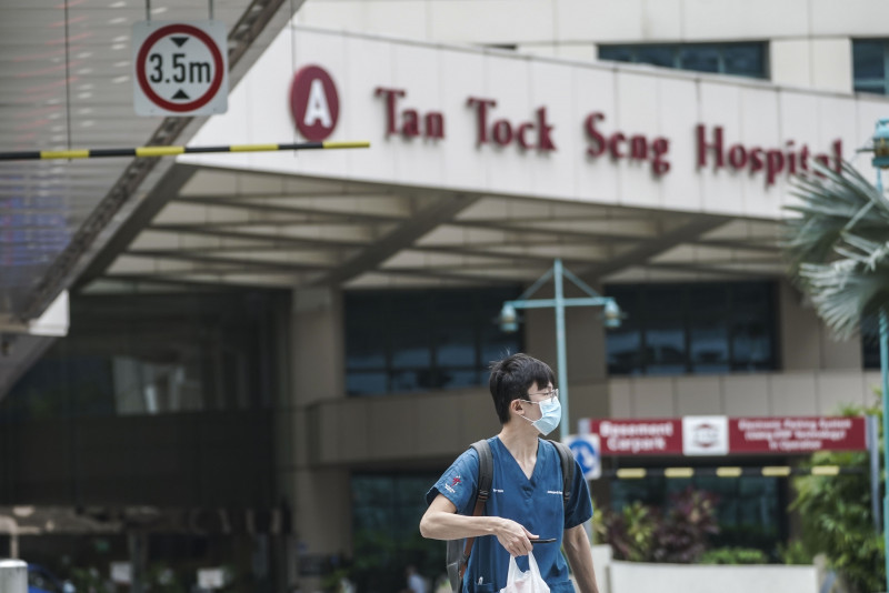 Singapore steps up virus curbs as infection clusters grow