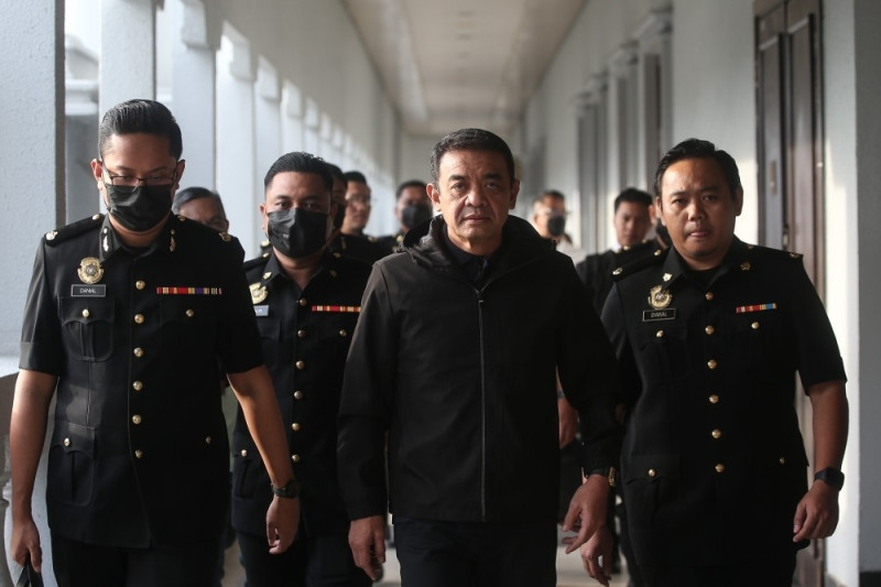 What transpired leading to ex-military couple charged in major money laundering scandal