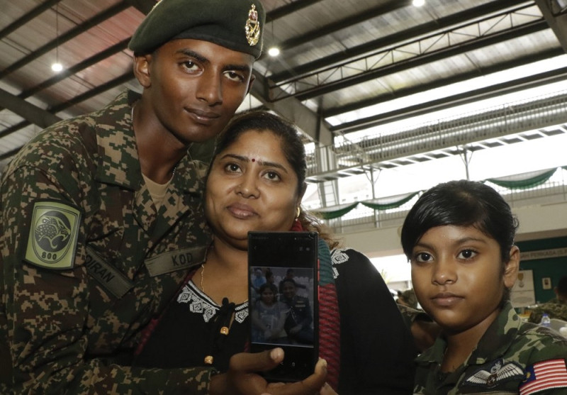 Mother rejects bullying claims in death of young Malaysian soldier