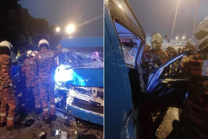 Factory vans collide in Penang, driver trapped