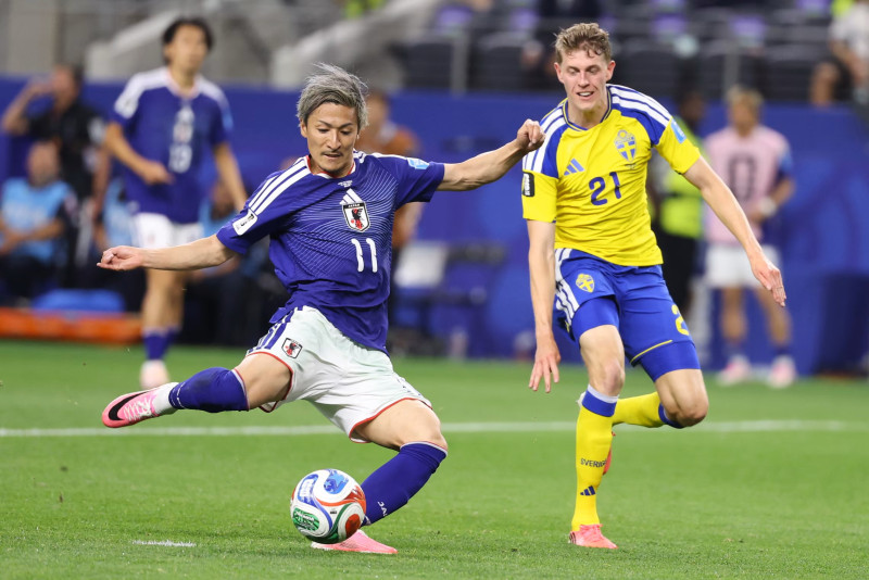 Japan draws with Sweden to secure knockout berth as both nations advance from Group F