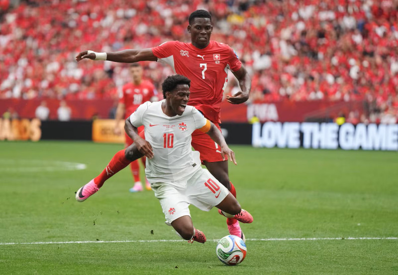 Switzerland clinch Group B crown as Canada makes historic World Cup breakthrough