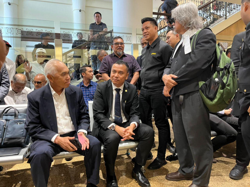 Yusof, Andi place faith in judiciary, vow to clear names in graft trial