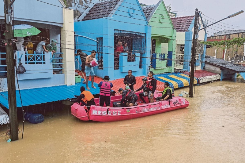Malaysians trapped in southern Thailand floods endure harrowing journey home