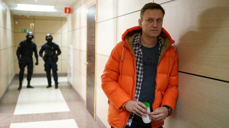 Police detain Kremlin critic Navalny on arrival in Russia