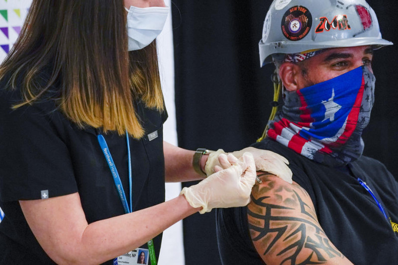 Half of US adults have had at least one Covid-19 vaccine dose