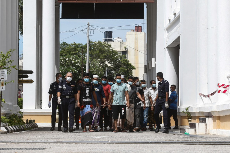 Court metes out RM125,000 fine to 25 construction workers in Raya Haji feast
