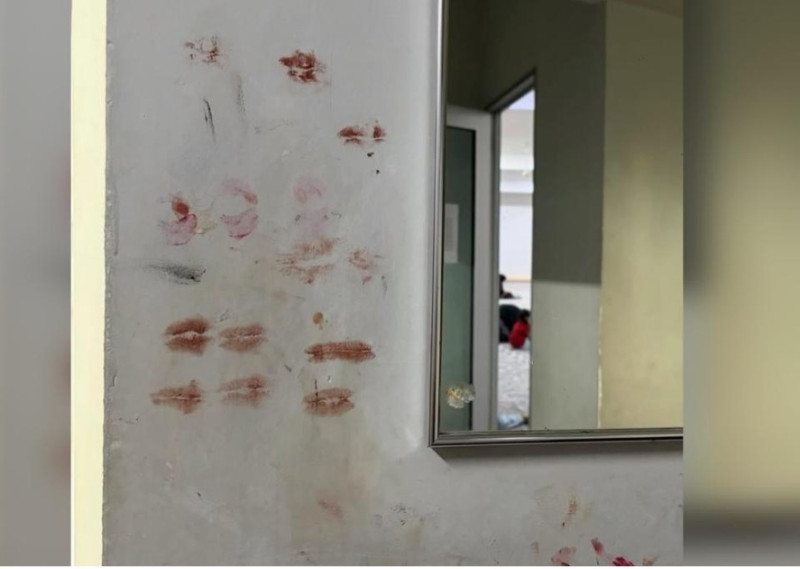 Mosque wall covered in lipstick marks raises questions