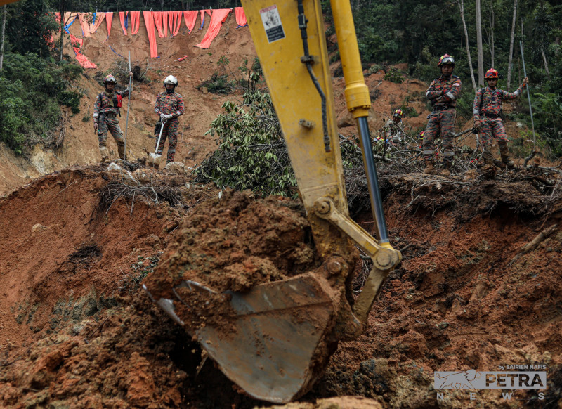 Batang Kali landslide: searchers make use of excavators to find last missing victim