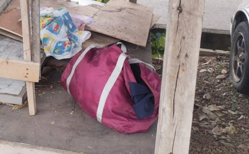 Baby girl found abandoned in a bag under car garage