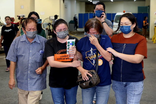 Batang Kali landslide: grief-stricken woman loses four family members in tragedy