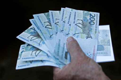 Brazil holds interest rate at record low