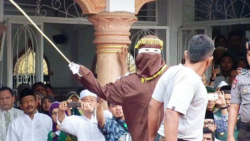 Malaysia must toughen penalties on scams, experts say, including caning